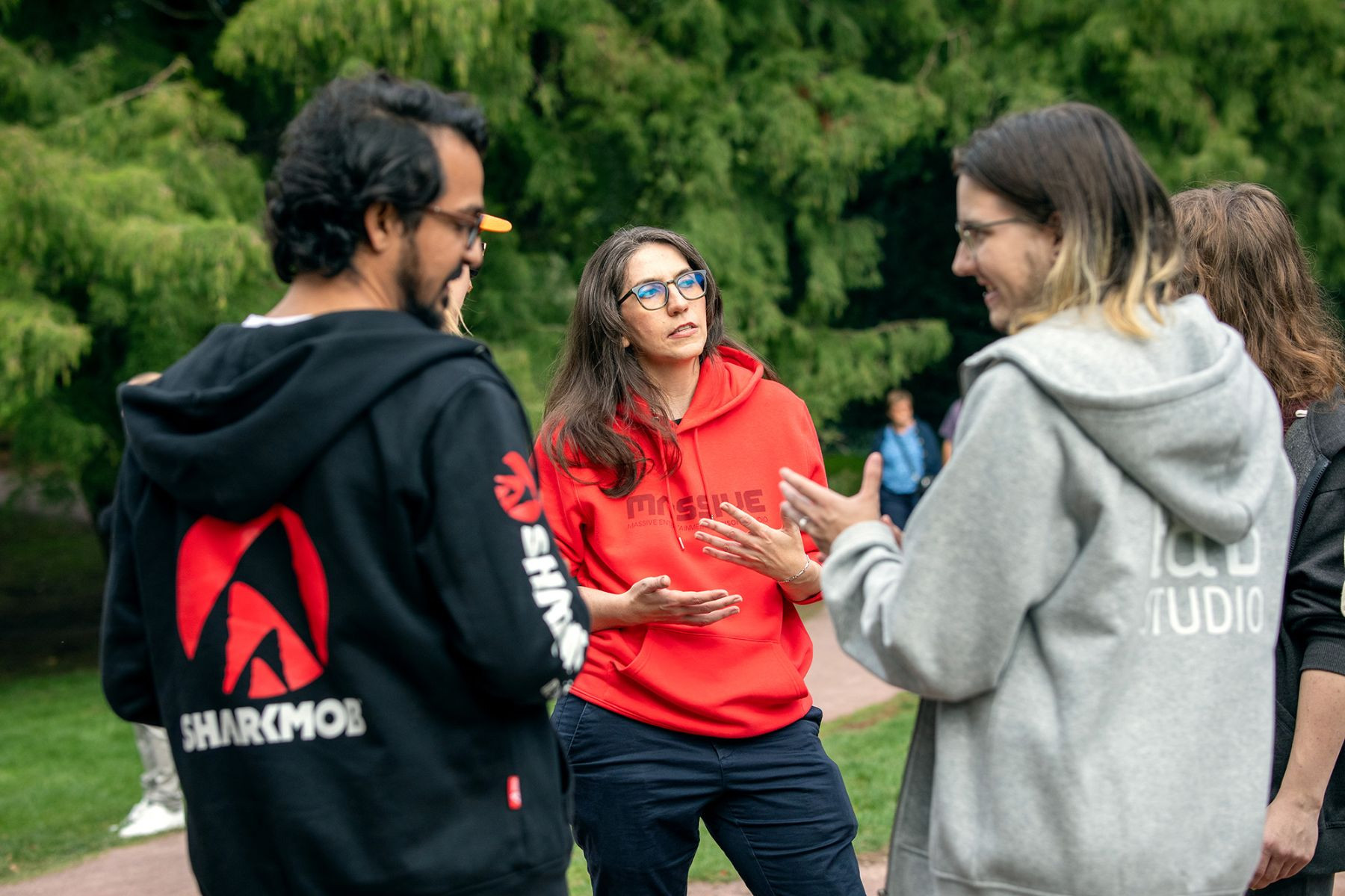Game developers in the park talking