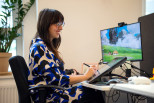 Game developer working by her computer